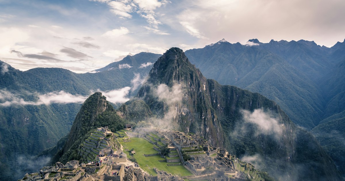 Machu Picchu citadel set among the misty peaks of the Peruvian Andes